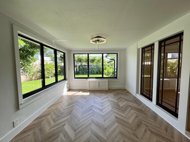 view of unfurnished sunroom