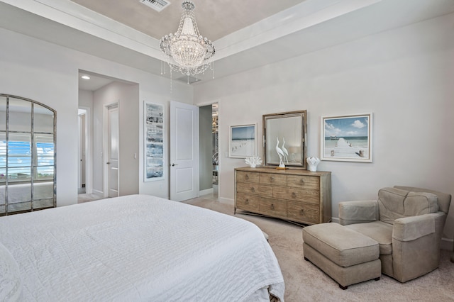 carpeted bedroom featuring a notable chandelier