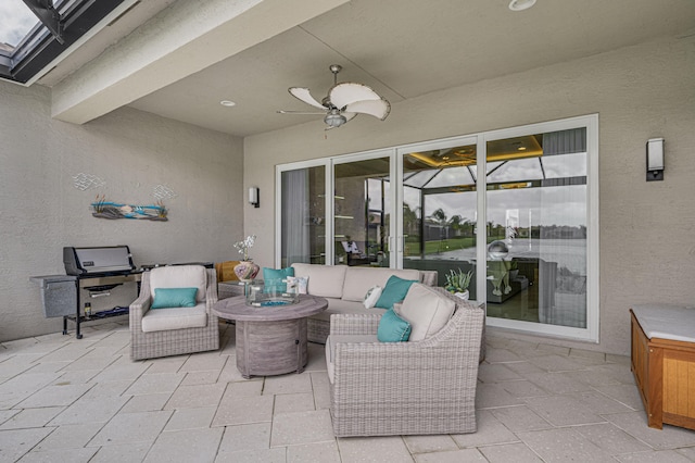 view of patio featuring ceiling fan and an outdoor hangout area