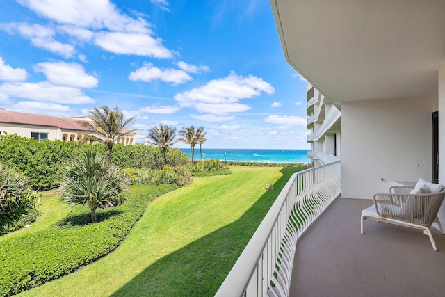 balcony featuring a water view