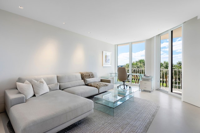 living room with floor to ceiling windows