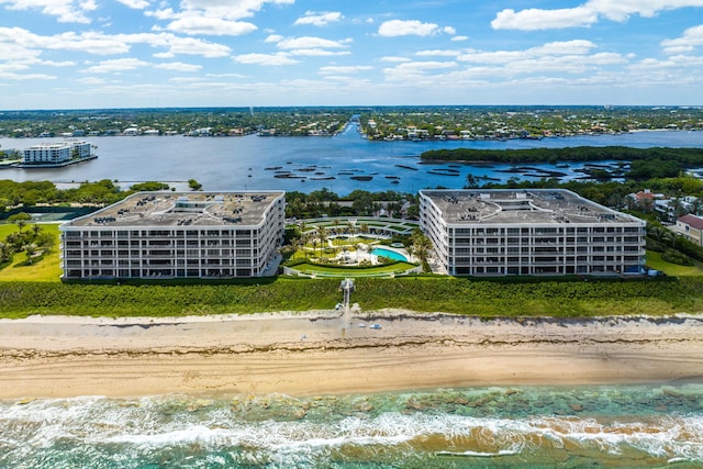 aerial view featuring a water view and a view of the beach