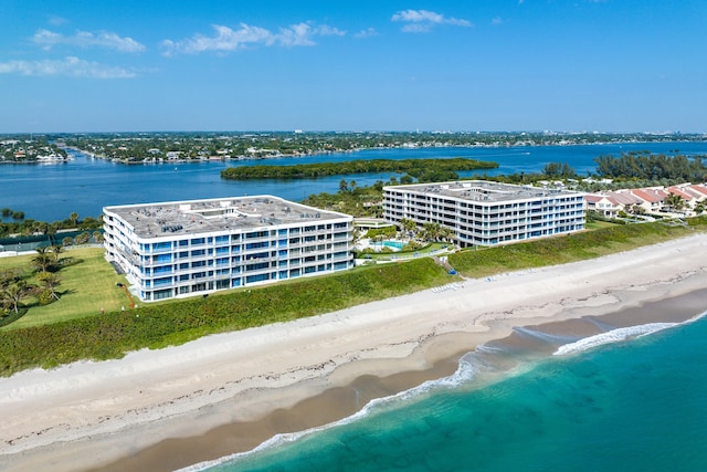 aerial view with a view of the beach and a water view