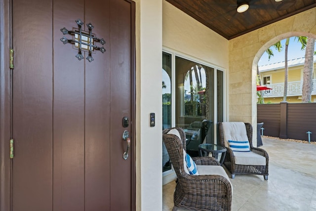 entrance to property featuring covered porch