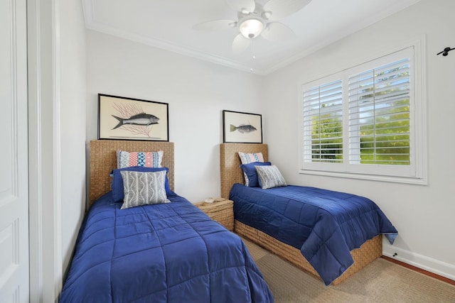 bedroom with hardwood / wood-style flooring, ceiling fan, and ornamental molding