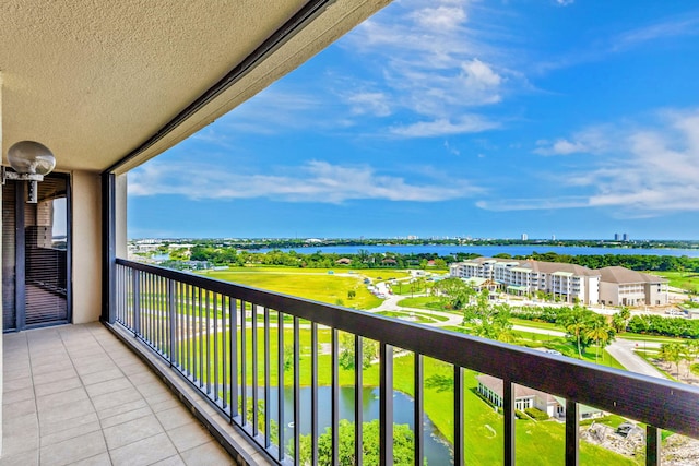 balcony featuring a water view