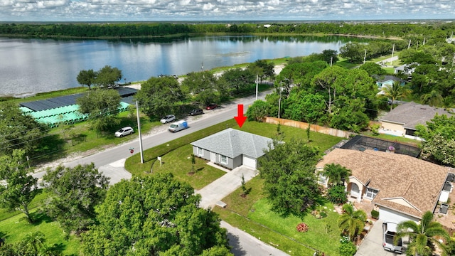 bird's eye view with a water view