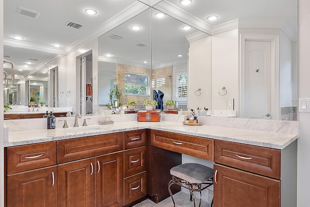 bathroom with vanity and crown molding