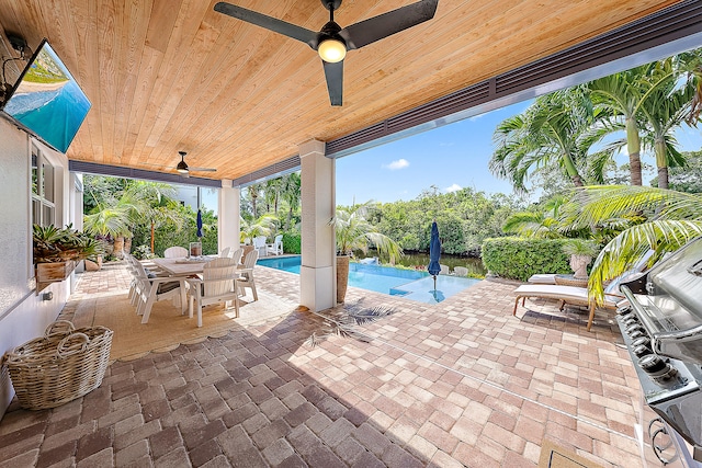 view of patio / terrace featuring ceiling fan