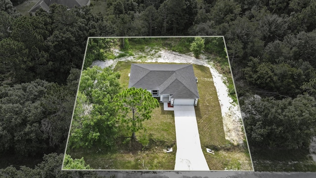 3848 NW 19th Ave, Okeechobee, FL 34972 - view from above of property with property parcel outlined and a forest