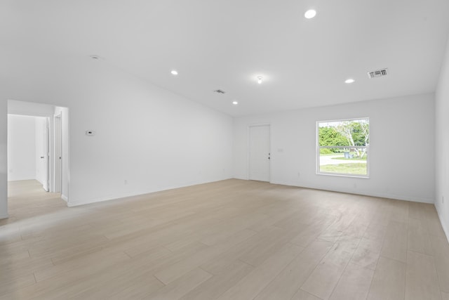 3848 NW 19th Ave, Okeechobee, FL 34972 - spare room featuring recessed lighting, light wood-style flooring, and baseboards