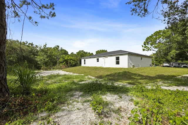 3848 NW 19th Ave, Okeechobee, FL 34972 - view of green lawn