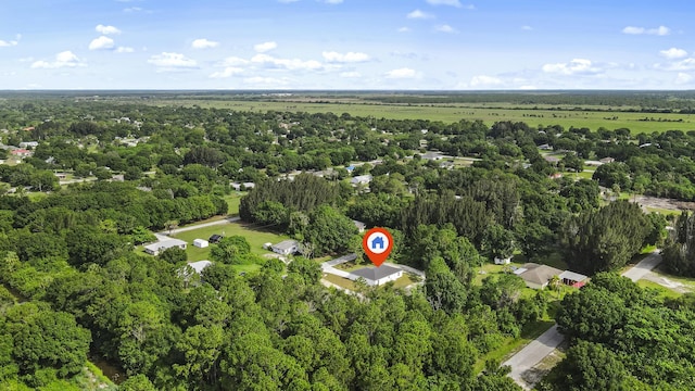 3848 NW 19th Ave, Okeechobee, FL 34972 - aerial overview of property's location featuring a forest