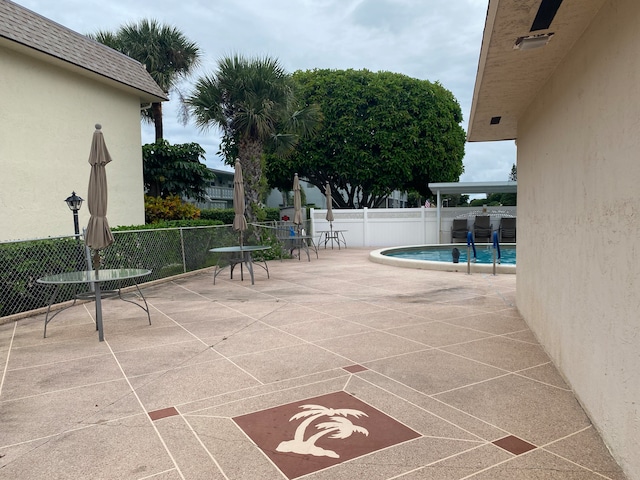 view of pool with a patio area