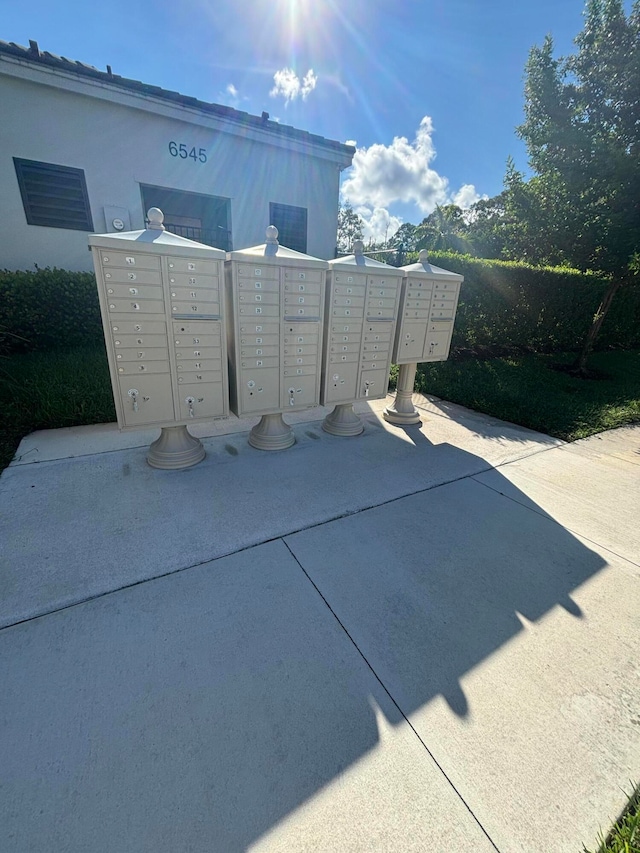 view of patio / terrace featuring a mail area