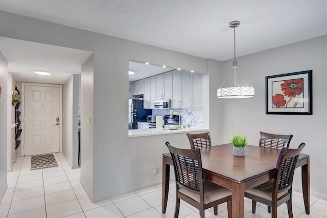 dining room with light tile patterned floors