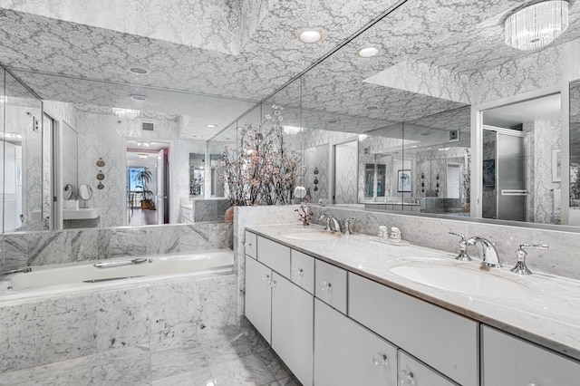 bathroom with vanity, a chandelier, and plus walk in shower