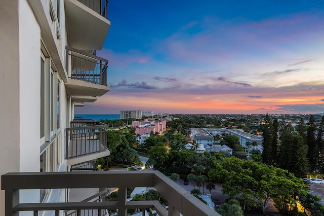 view of balcony at dusk