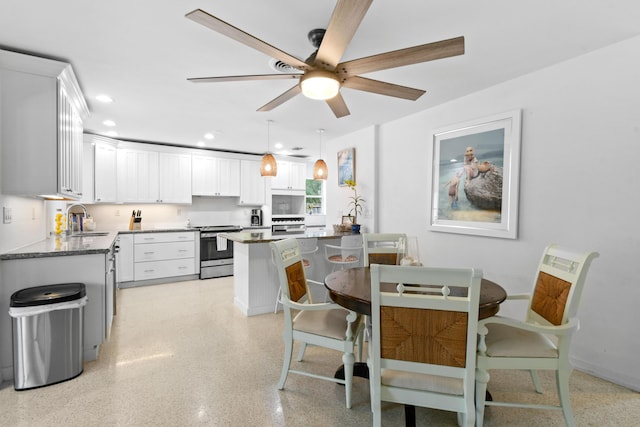 8045 W Lake Dr, Lake Clarke Shores, FL 33406 - dining area featuring ceiling fan, recessed lighting, and baseboards