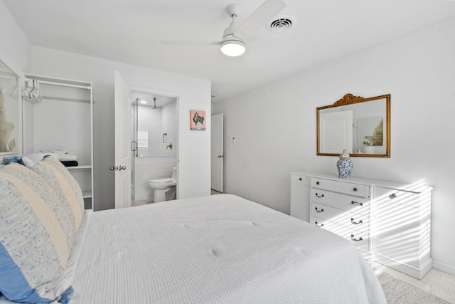 8045 W Lake Dr, Lake Clarke Shores, FL 33406 - bedroom with ceiling fan, ensuite bathroom, and baseboards