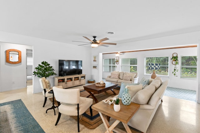 living room featuring ceiling fan