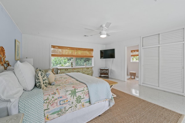 8045 W Lake Dr, Lake Clarke Shores, FL 33406 - bedroom with multiple windows and a ceiling fan