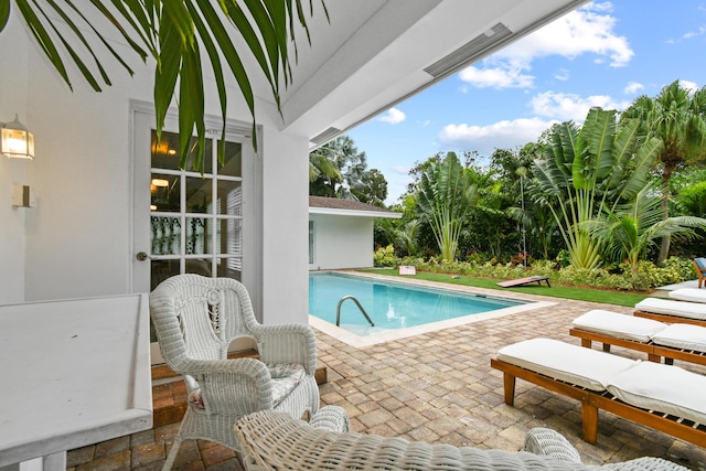 8045 W Lake Dr, Lake Clarke Shores, FL 33406 - outdoor pool featuring a patio area