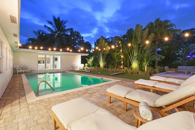8045 W Lake Dr, Lake Clarke Shores, FL 33406 - swimming pool with a patio area and french doors