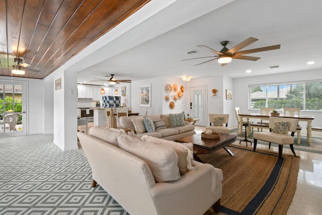 8045 W Lake Dr, Lake Clarke Shores, FL 33406 - living room featuring a ceiling fan, baseboards, and recessed lighting