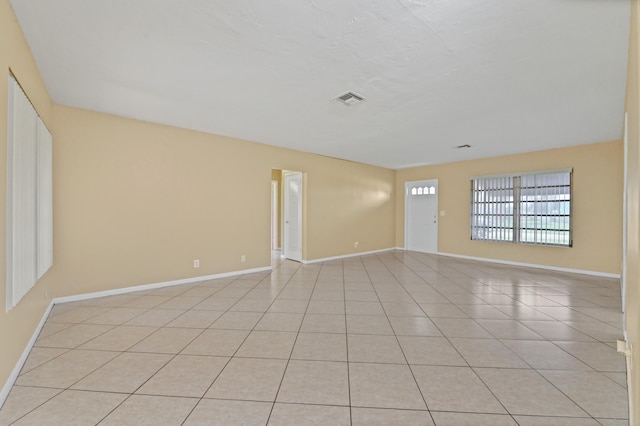 view of tiled spare room