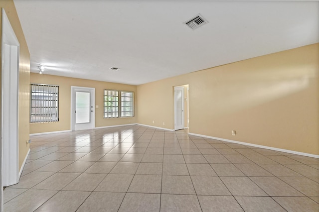 view of tiled spare room