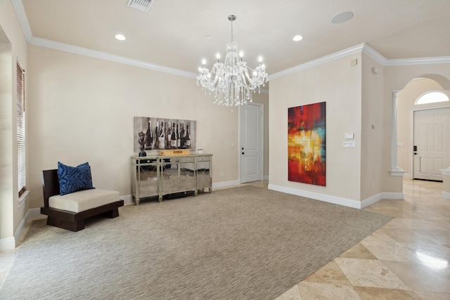 living area with crown molding and a chandelier