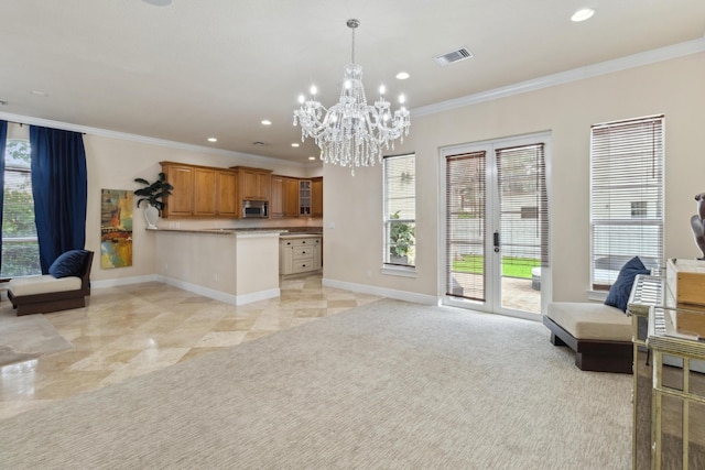 interior space with a chandelier and crown molding