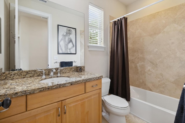 full bathroom with vanity, shower / bath combo with shower curtain, toilet, and tile patterned floors