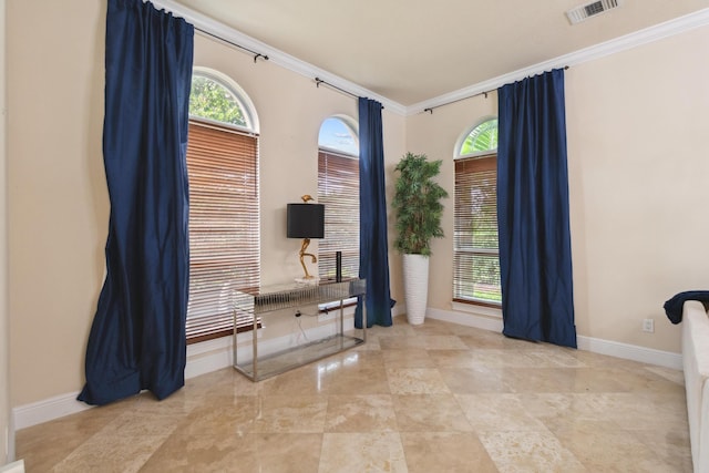 foyer entrance featuring ornamental molding