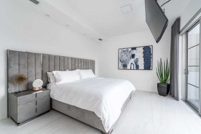 bedroom featuring baseboards