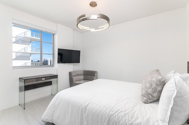 bedroom featuring baseboards