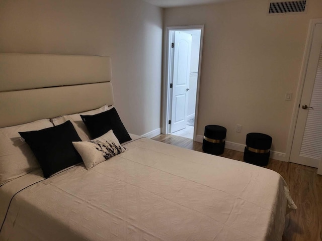 bedroom featuring light hardwood / wood-style flooring