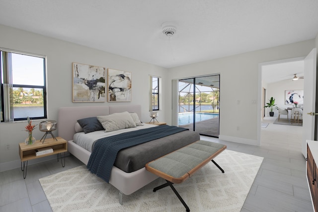 5625 Aspen Ridge Cir, Delray Beach, FL 33484 - bedroom with access to exterior and baseboards