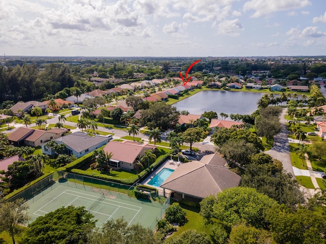 aerial view with a residential view and a water view