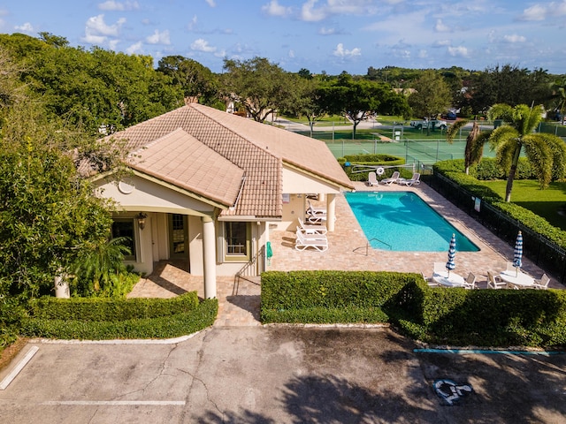 view of pool with a fenced in pool, a patio area, and a fenced backyard
