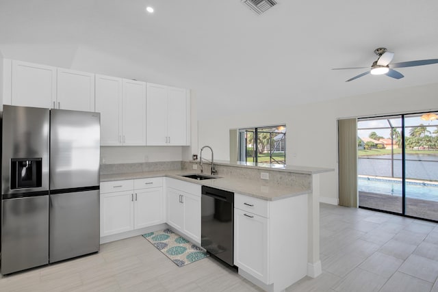 5625 Aspen Ridge Cir, Delray Beach, FL 33484 - kitchen featuring stainless steel fridge, black dishwasher, a sink, a peninsula, and ceiling fan