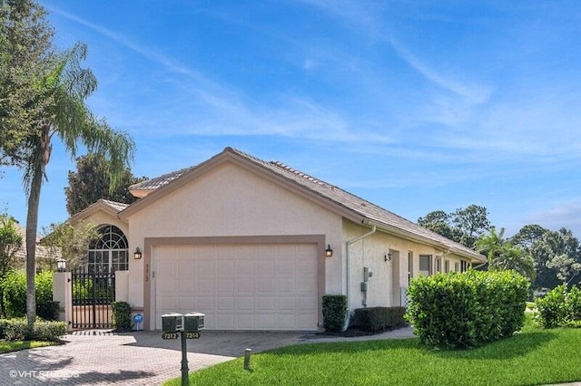 ranch-style house with a garage