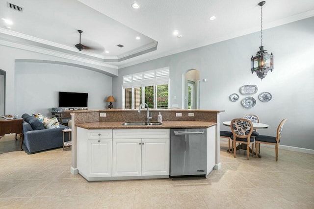 kitchen featuring a center island with sink, sink, white cabinetry, dishwasher, and decorative light fixtures