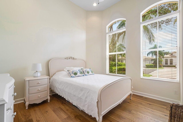 bedroom featuring hardwood / wood-style floors