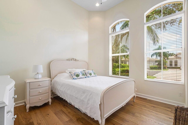 101 Dalena Way, Palm Beach Gardens, FL 33418 - bedroom with wood finished floors and baseboards