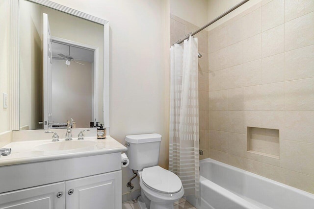 full bathroom featuring toilet, vanity, and shower / bath combination with curtain