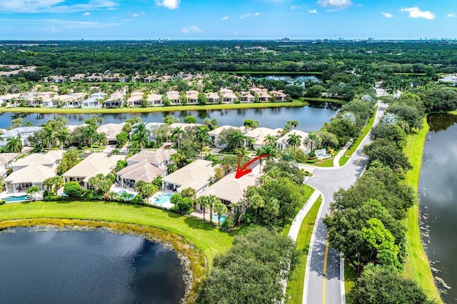 birds eye view of property featuring a water view