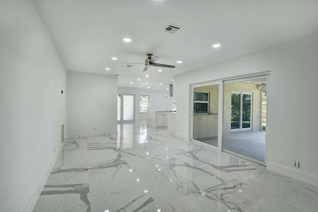 spare room featuring ceiling fan