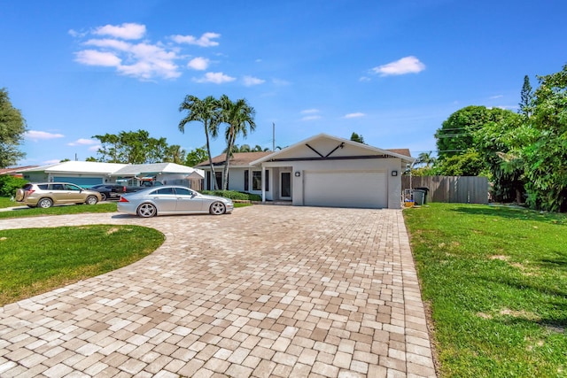 ranch-style house with a front yard and a garage